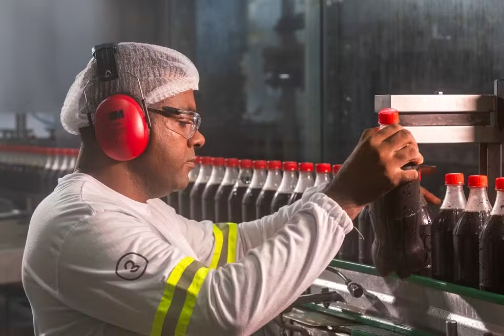 People working across teams at Coca-Cola